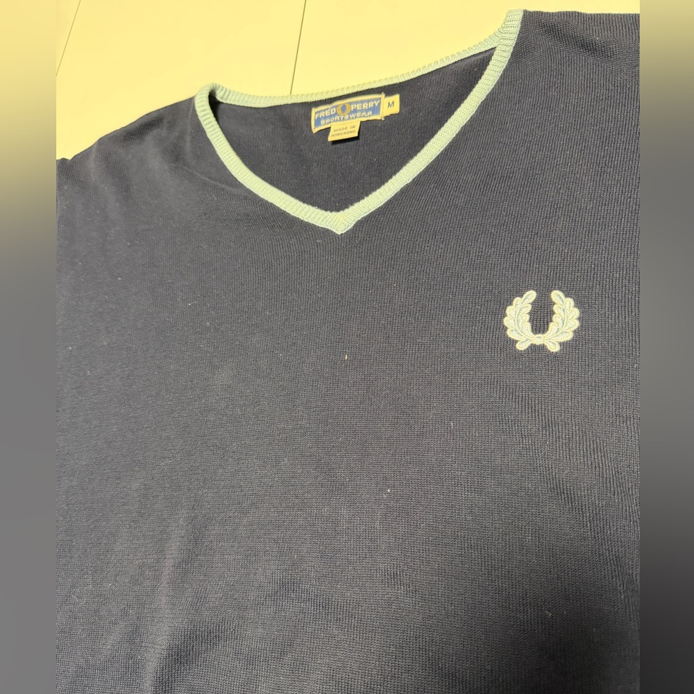 Fred Perry Blue Sportswear with light blue accents sweater